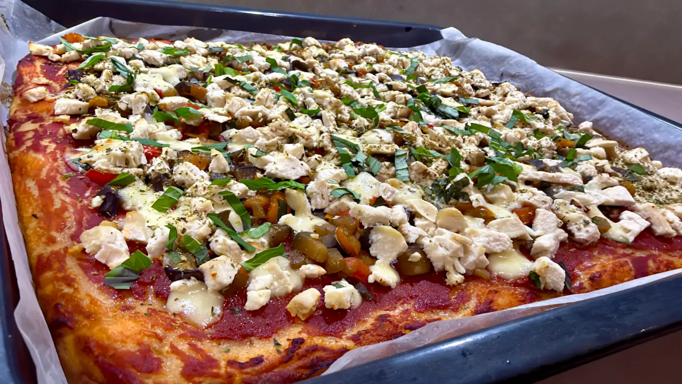 A homemade pizza representing one point in an endlessly changing recipe